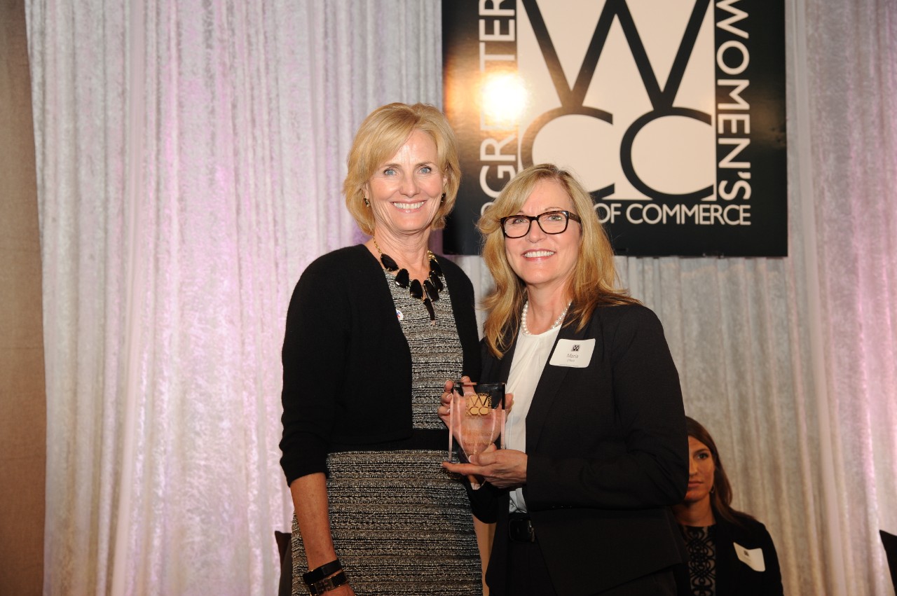 Valerie Gibbs presents the Trailblazer award to ABS Senior Vice President and CIO Maria O’Neill on behalf of the Greater Houston Women’s Chamber of Commerce.